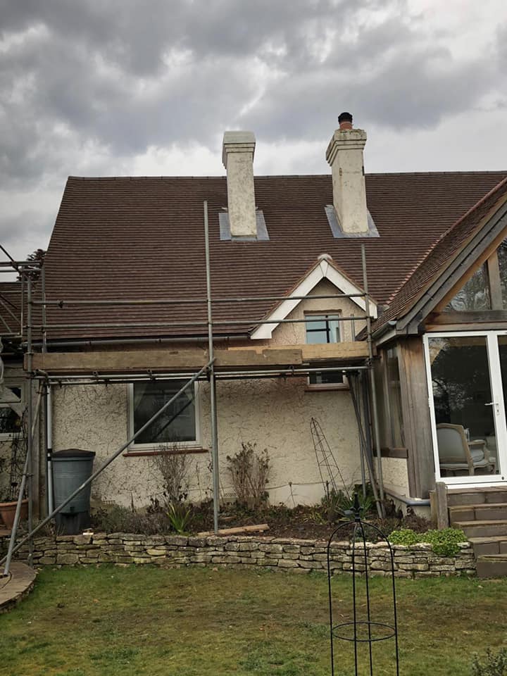 Professional roofers working on a property in London - KS Roof Master