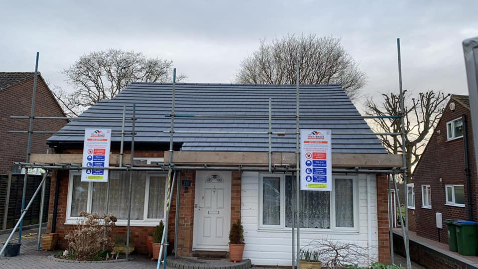 Professional roofers working on a property in London - KS Roof Master