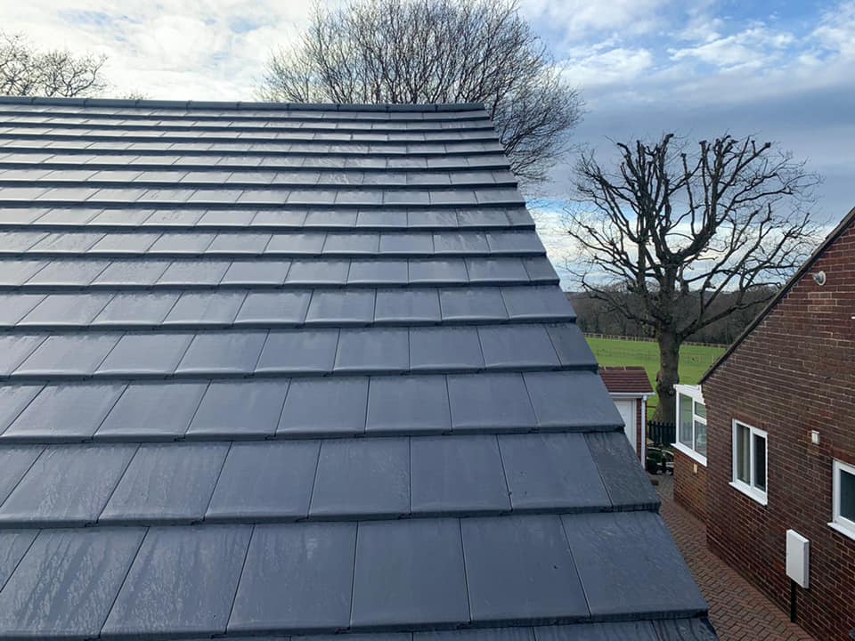 Professional roofers working on a property in London - KS Roof Master