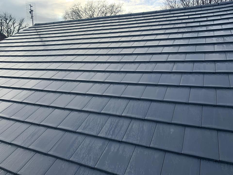 Professional roofers working on a property in London - KS Roof Master