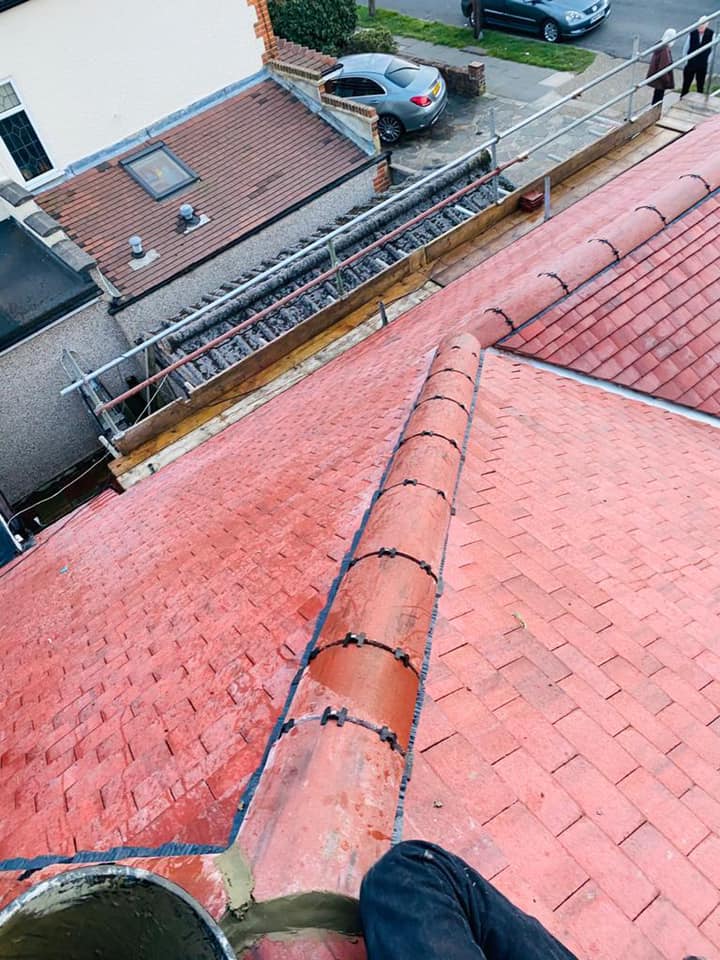 Professional roofers working on a property in London - KS Roof Master