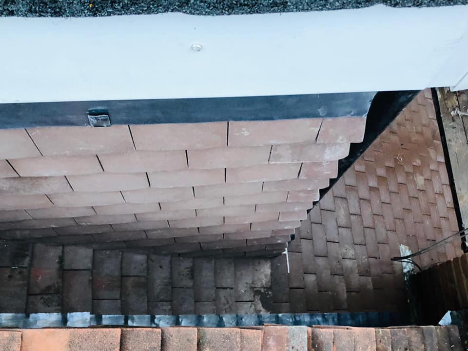 Professional roofers working on a property in London - KS Roof Master