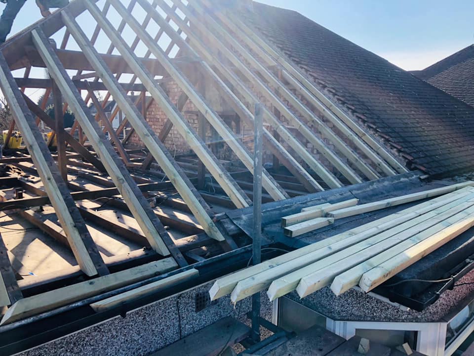 Professional roofers working on a property in London - KS Roof Master