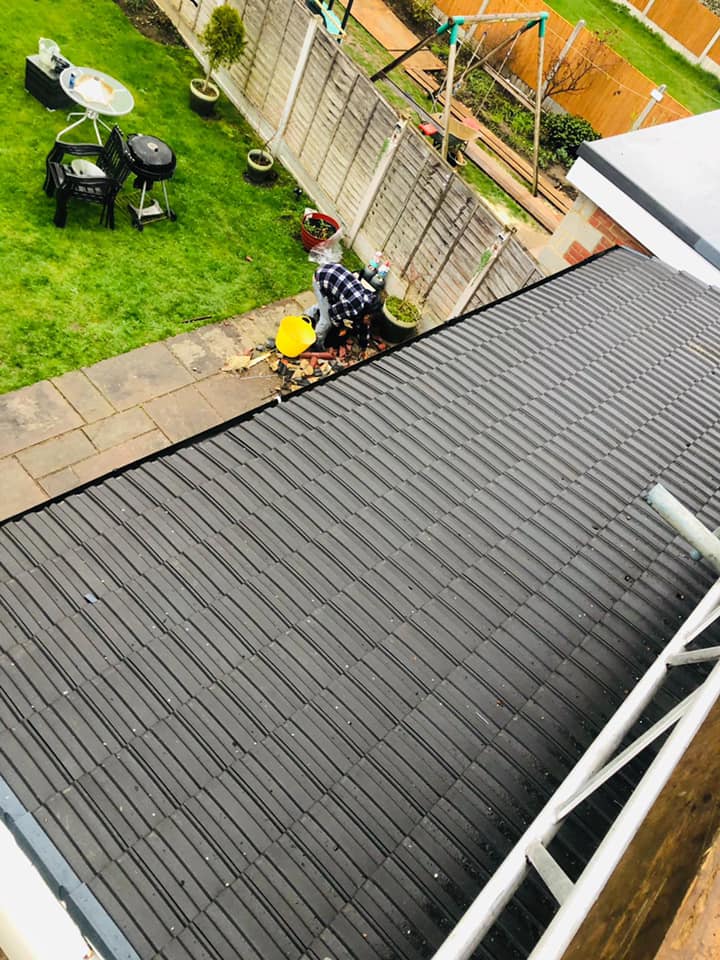 Professional roofers working on a property in London - KS Roof Master