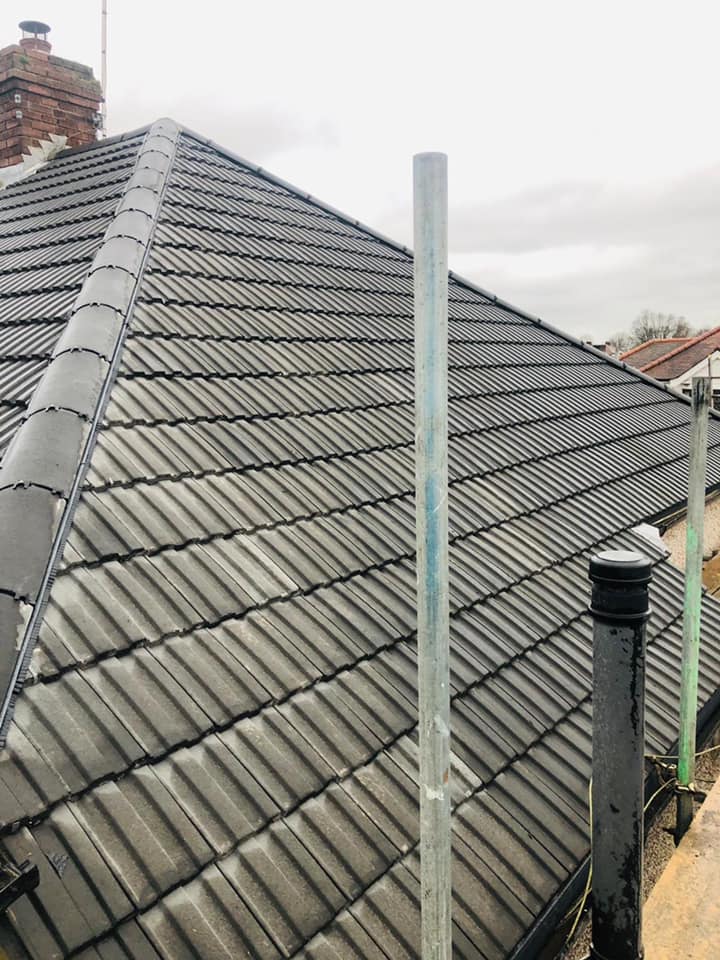 Professional roofers working on a property in London - KS Roof Master