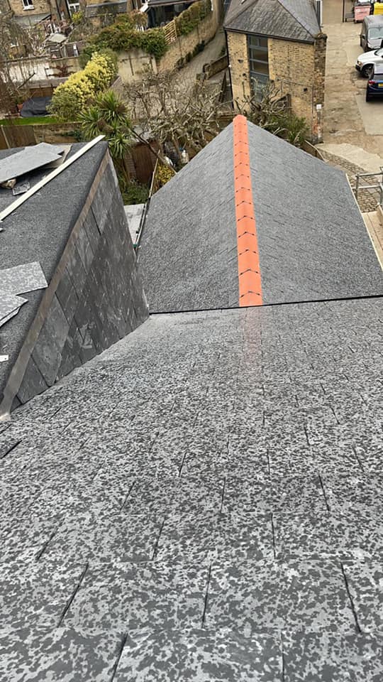 Professional roofers working on a property in London - KS Roof Master