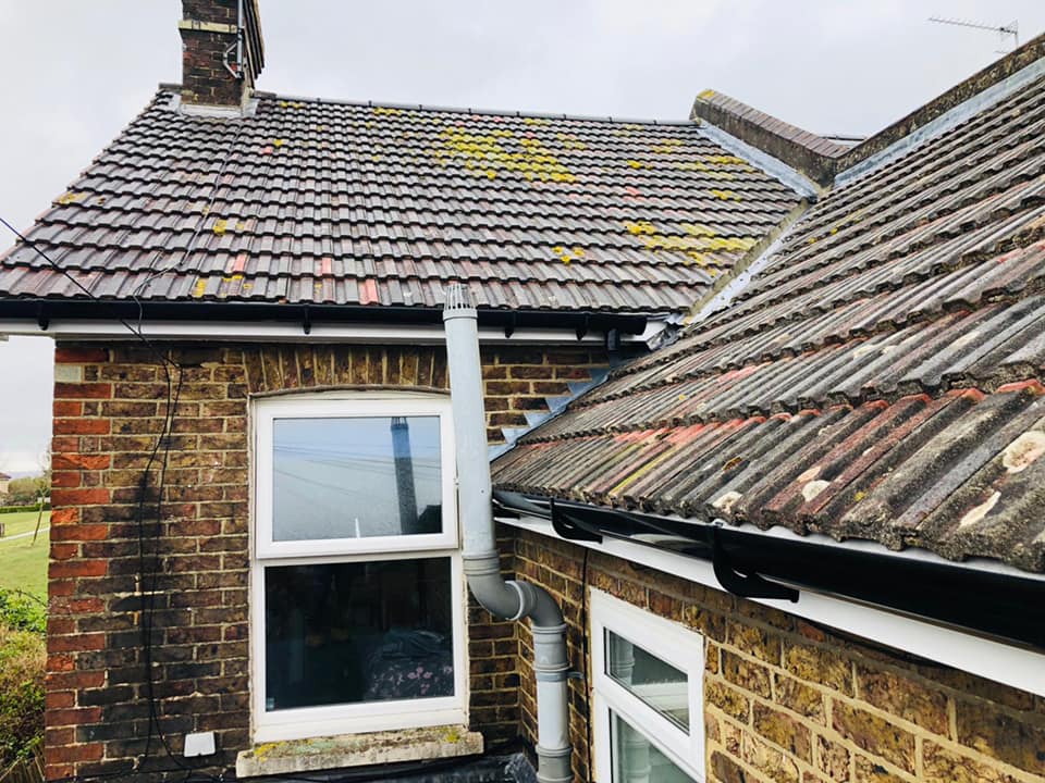 Professional roofers working on a property in London - KS Roof Master