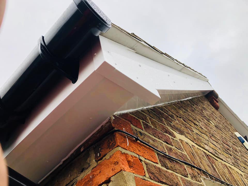 Professional roofers working on a property in London - KS Roof Master