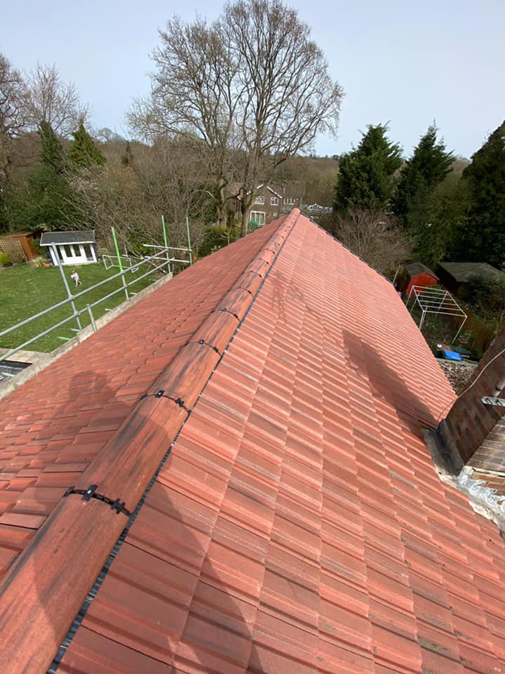 Professional roofers working on a property in London - KS Roof Master