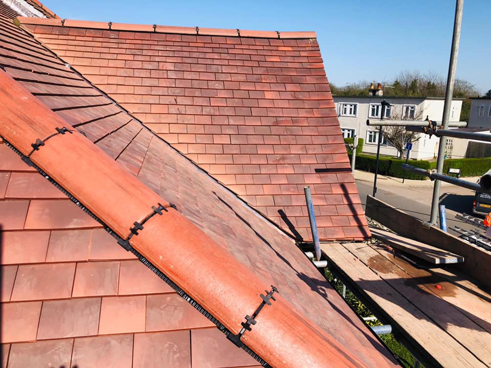 Professional roofers working on a property in London - KS Roof Master