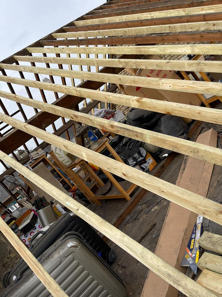Professional roofers working on a property in London - KS Roof Master