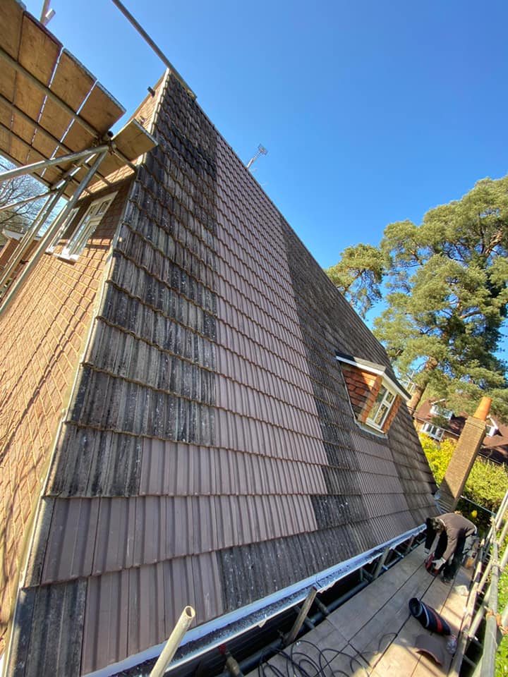 Professional roofers working on a property in London - KS Roof Master