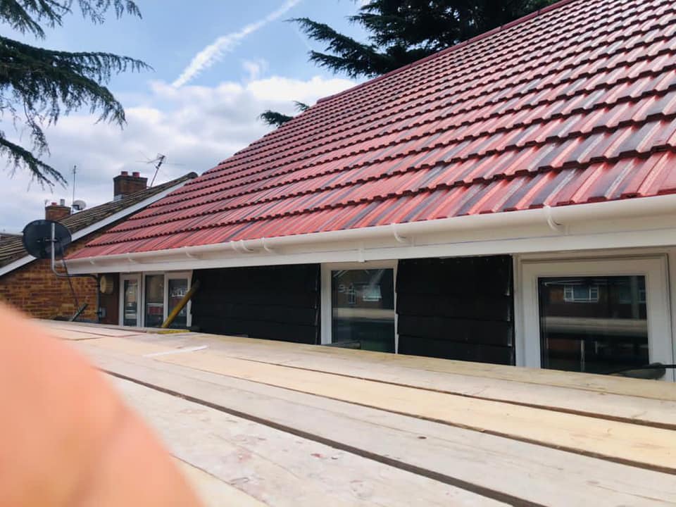 Professional roofers working on a property in London - KS Roof Master