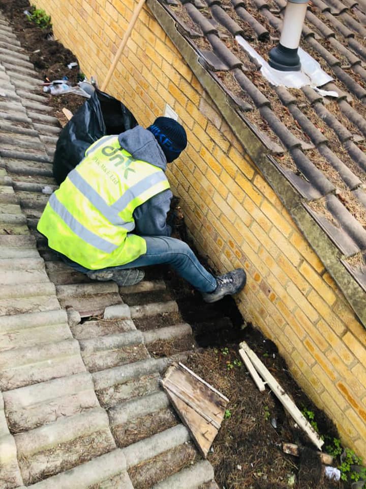 Professional roofers working on a property in London - KS Roof Master