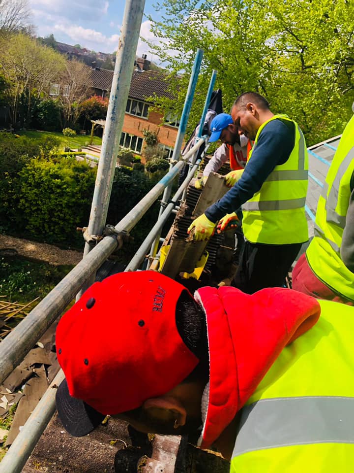 Professional roofers working on a property in London - KS Roof Master