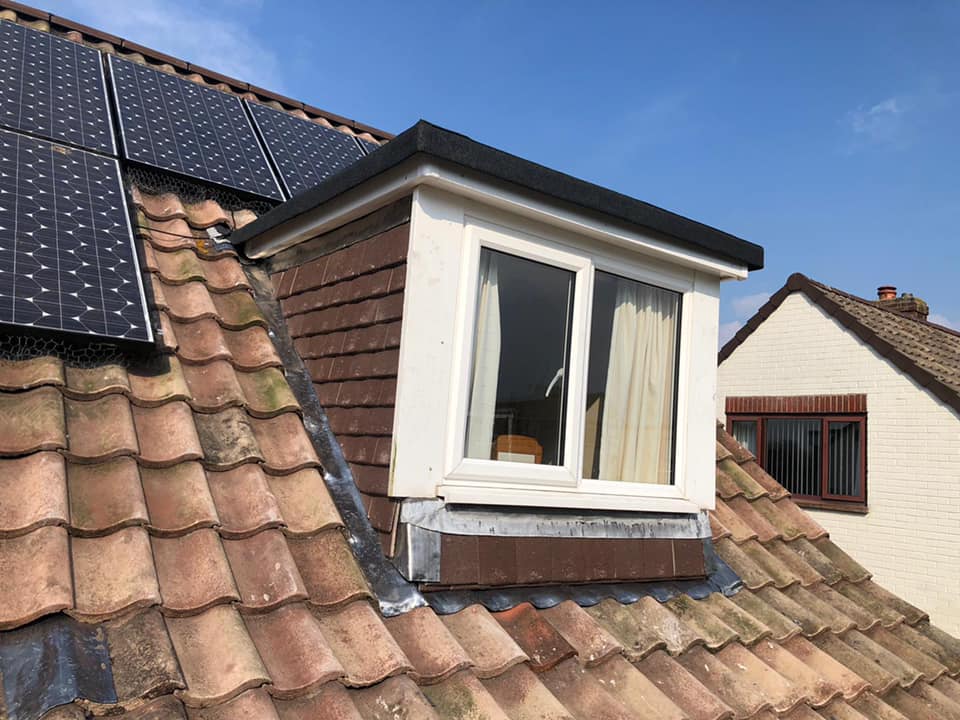 Professional roofers working on a property in London - KS Roof Master