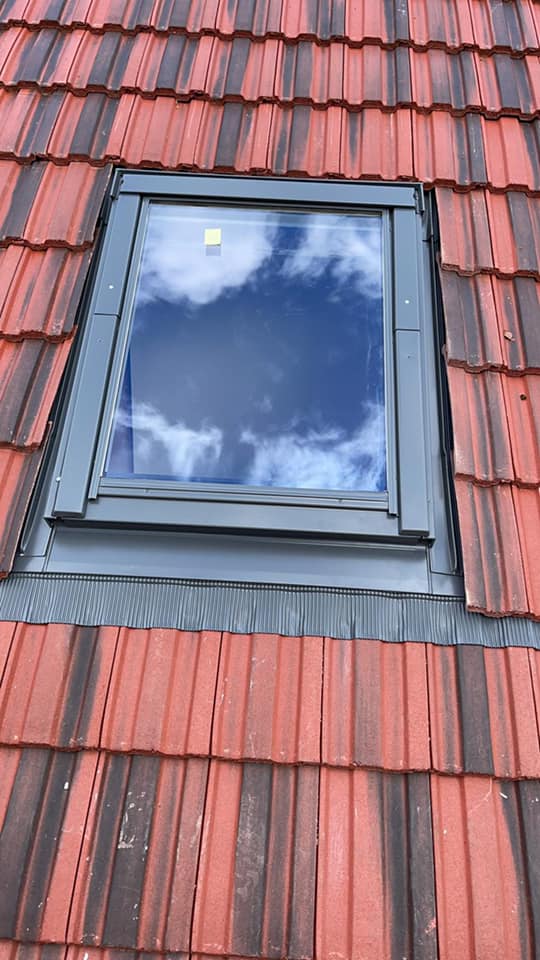 Professional roofers working on a property in London - KS Roof Master