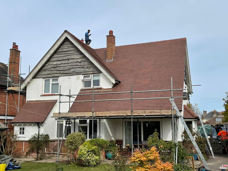 Professional roofers working on a property in London - KS Roof Master