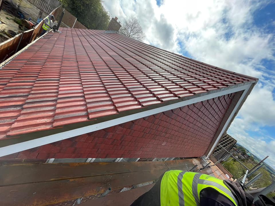 Professional roofers working on a property in London - KS Roof Master