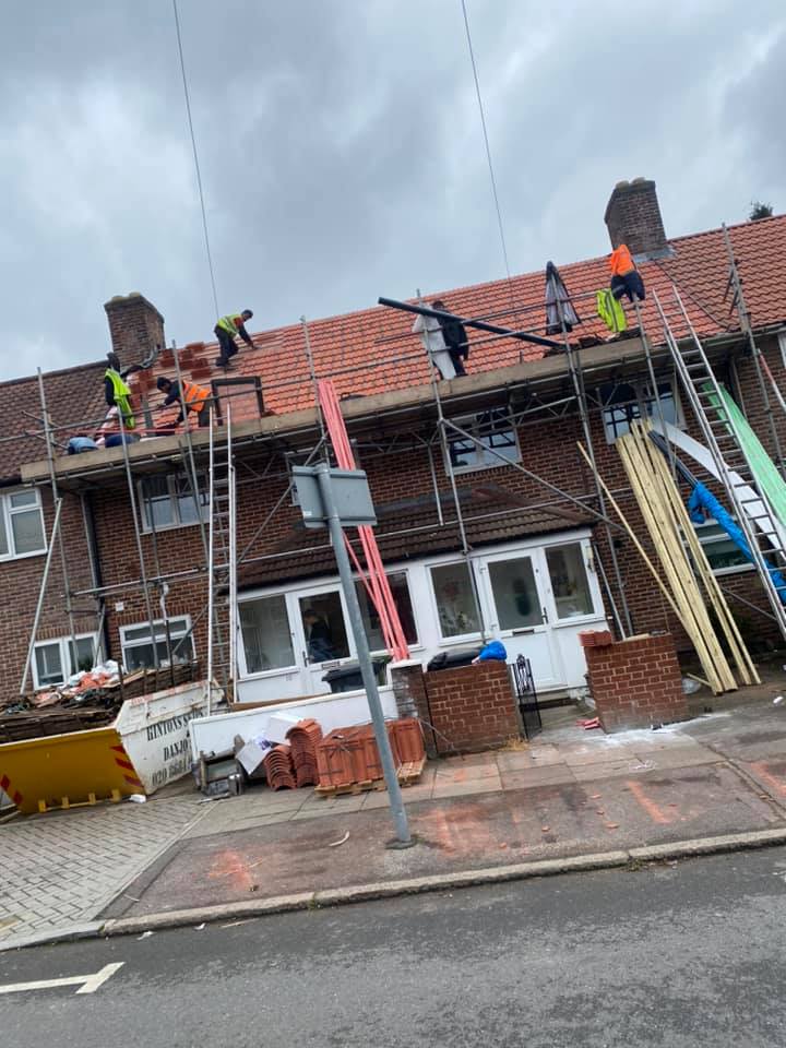 Professional roofers working on a property in London - KS Roof Master