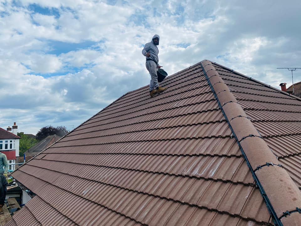 Professional roofers working on a property in London - KS Roof Master
