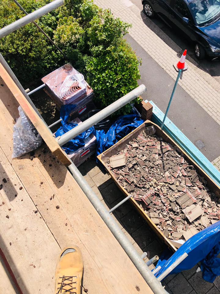 Professional roofers working on a property in London - KS Roof Master