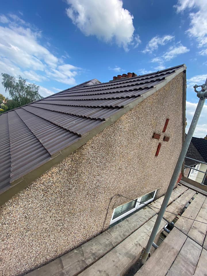 Professional roofers working on a property in London - KS Roof Master