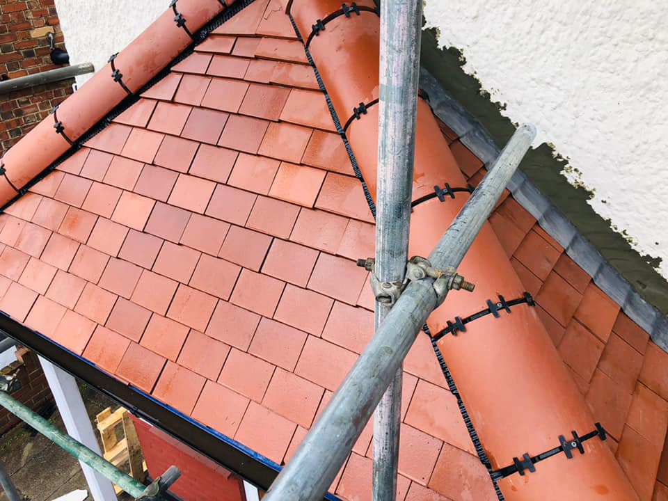Professional roofers working on a property in London - KS Roof Master