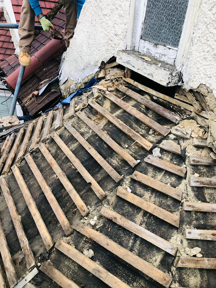 Professional roofers working on a property in London - KS Roof Master