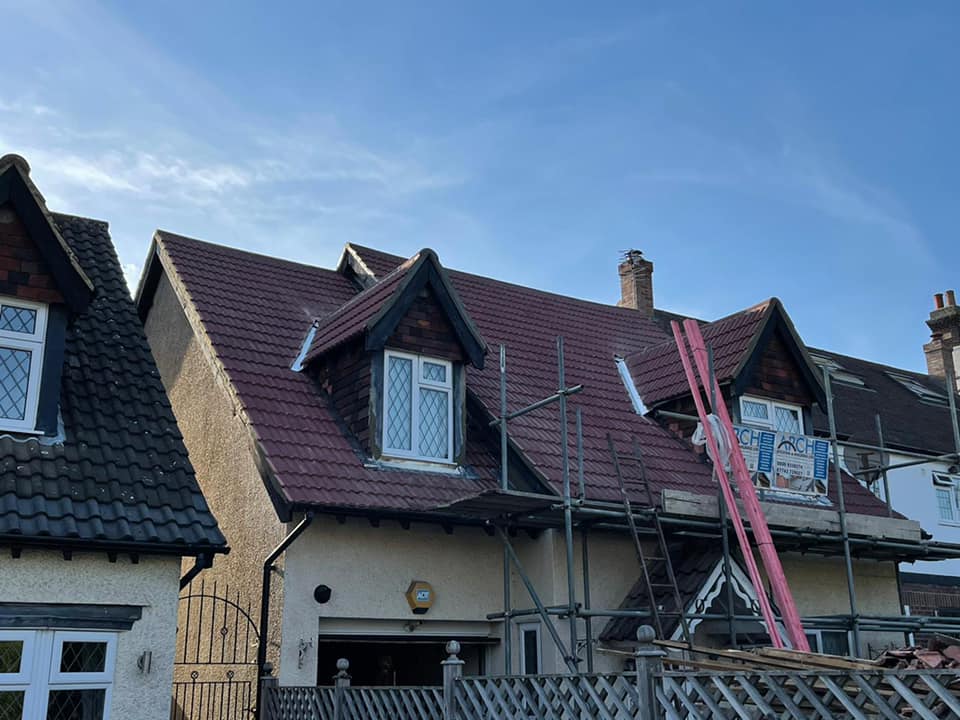 Professional roofers working on a property in London - KS Roof Master