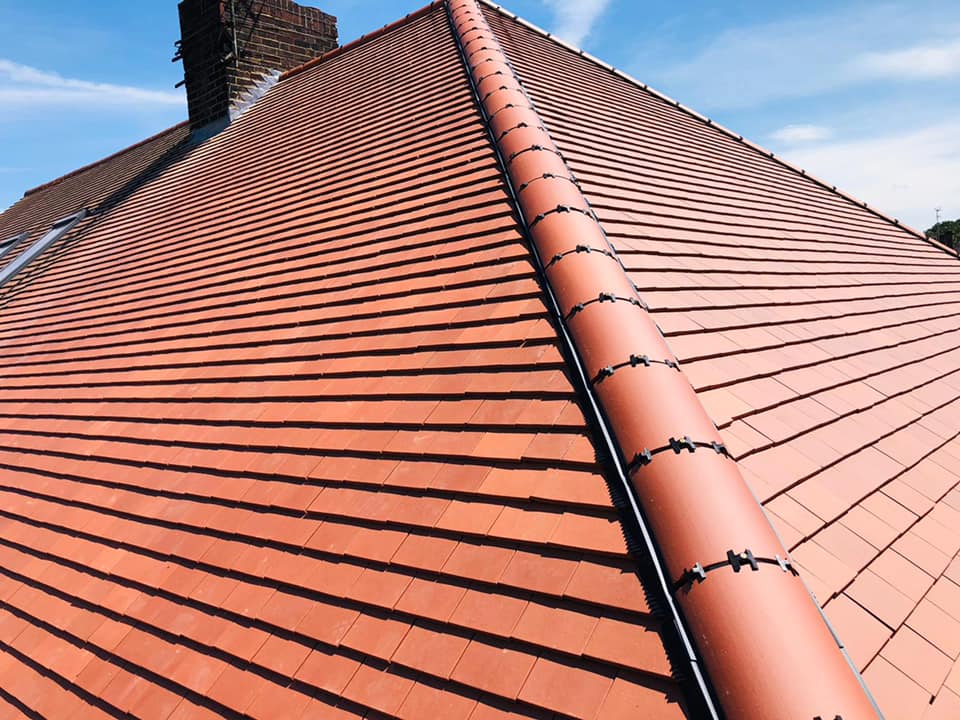 Professional roofers working on a property in London - KS Roof Master