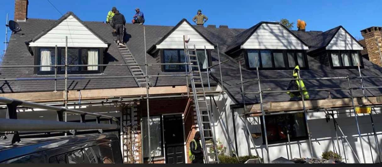 Professional roofers working on a property in London - KS Roof Master