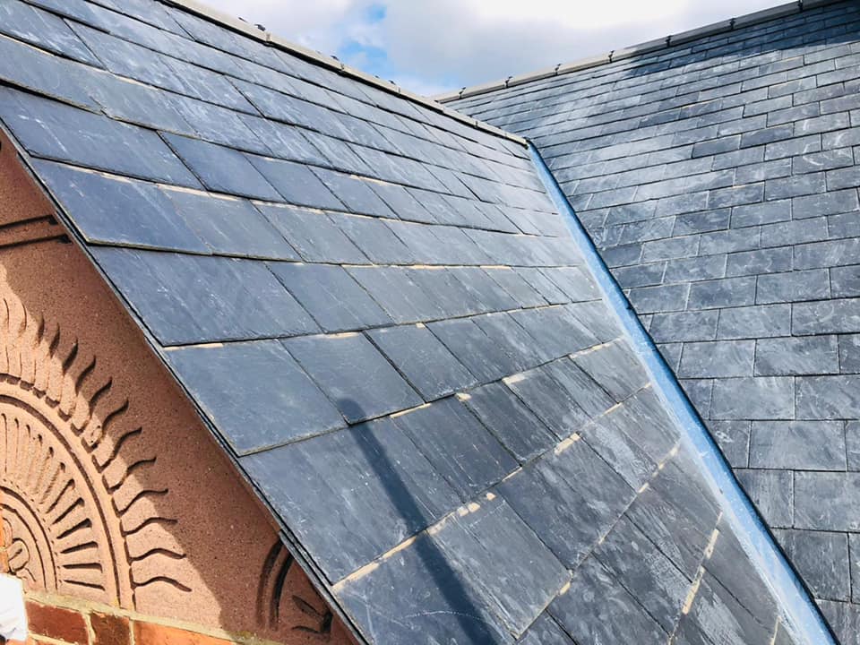 Professional roofers working on a property in London - KS Roof Master