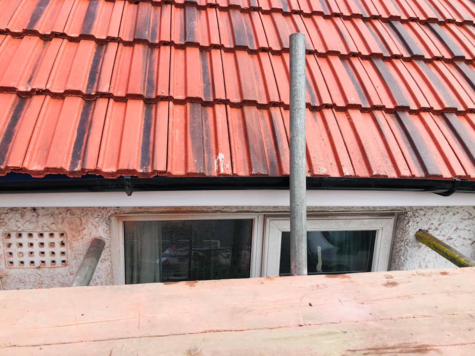 Professional roofers working on a property in London - KS Roof Master