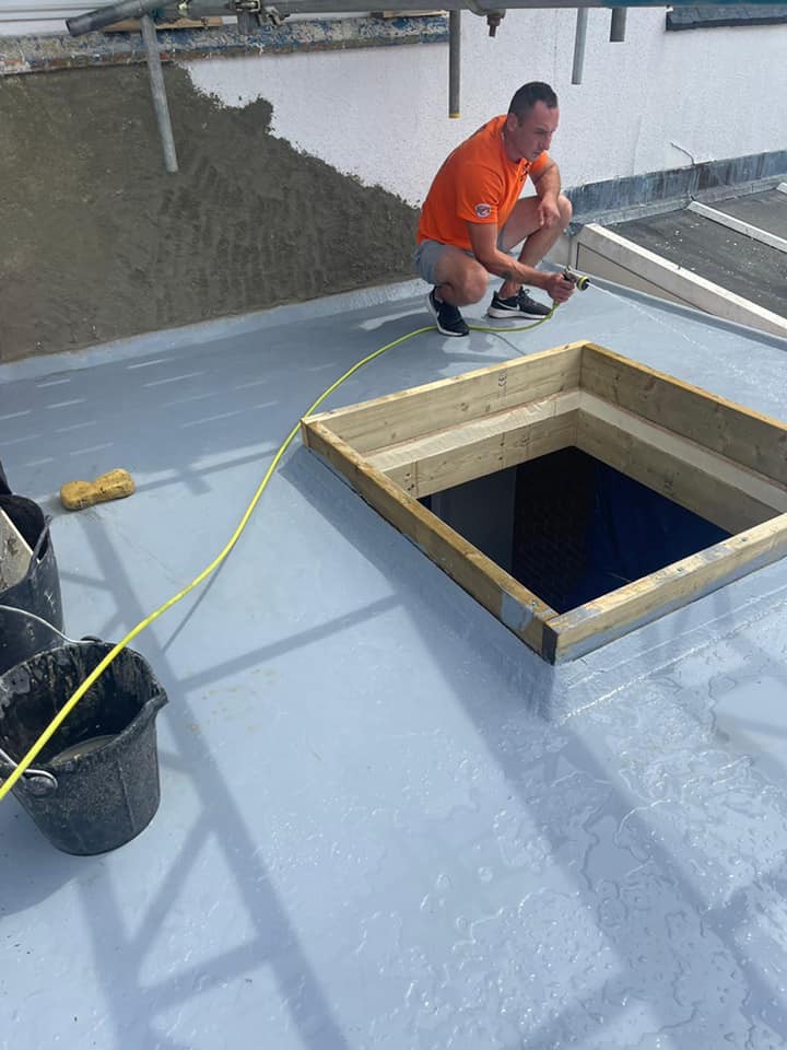 Professional roofers working on a property in London - KS Roof Master
