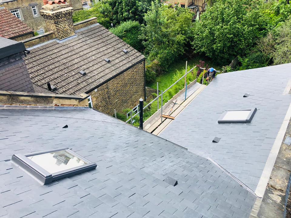 Professional roofers working on a property in London - KS Roof Master