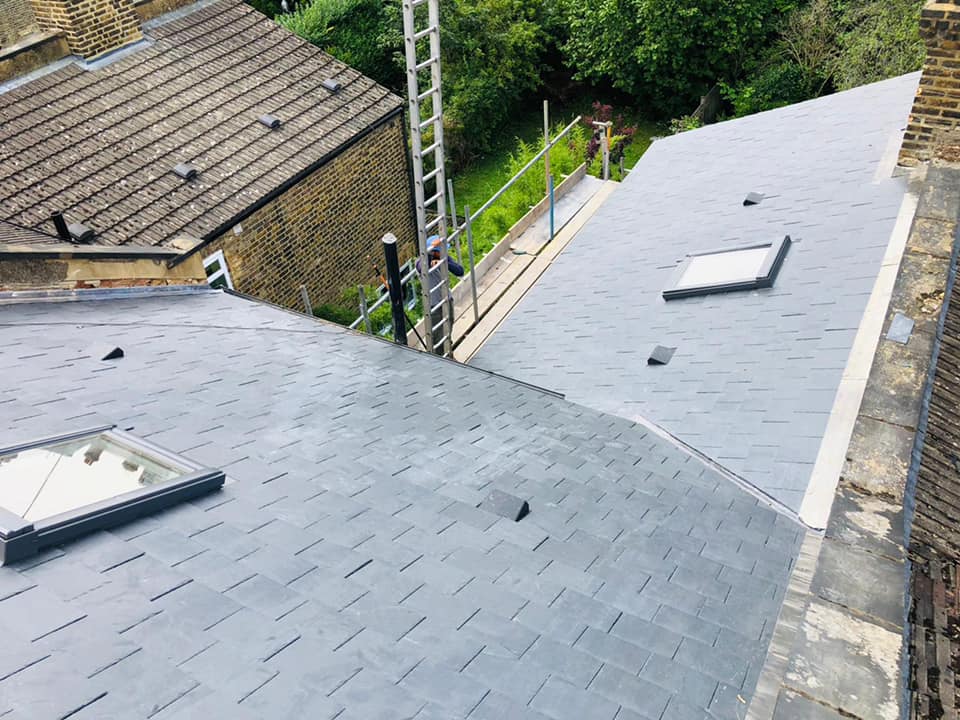 Professional roofers working on a property in London - KS Roof Master