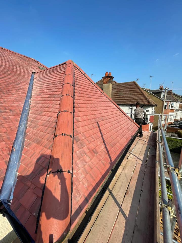 Professional roofers working on a property in London - KS Roof Master