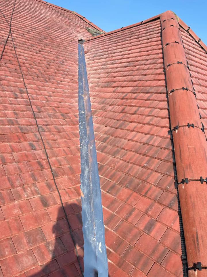 Professional roofers working on a property in London - KS Roof Master