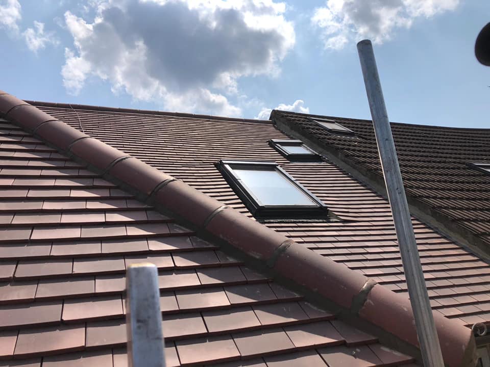 Professional roofers working on a property in London - KS Roof Master