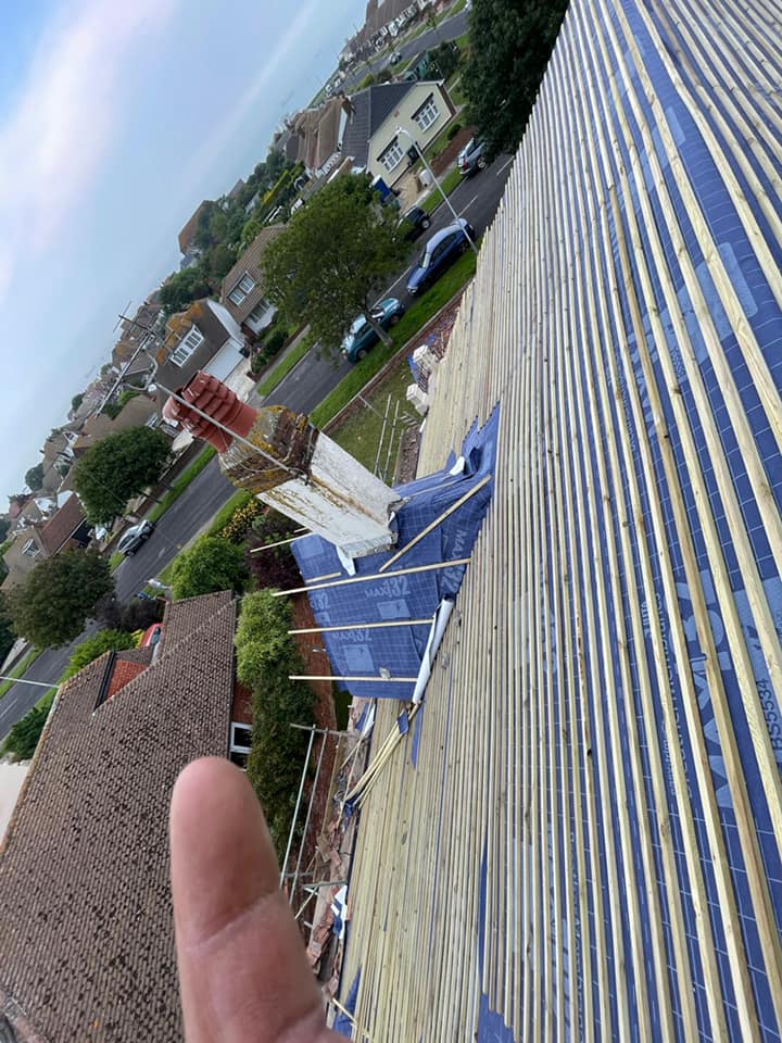 Professional roofers working on a property in London - KS Roof Master