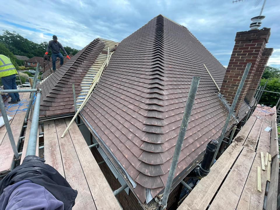 Professional roofers working on a property in London - KS Roof Master