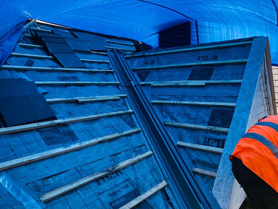 Professional roofers working on a property in London - KS Roof Master