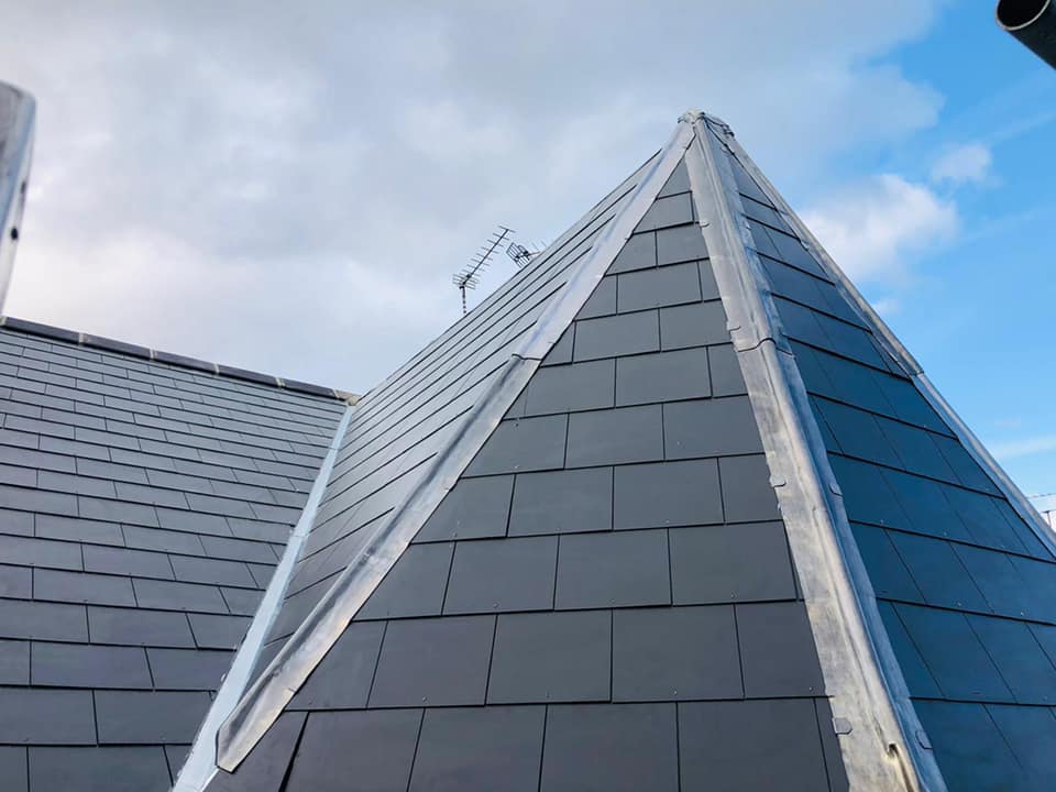 Professional roofers working on a property in London - KS Roof Master