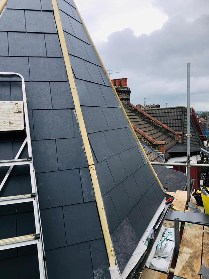 Professional roofers working on a property in London - KS Roof Master