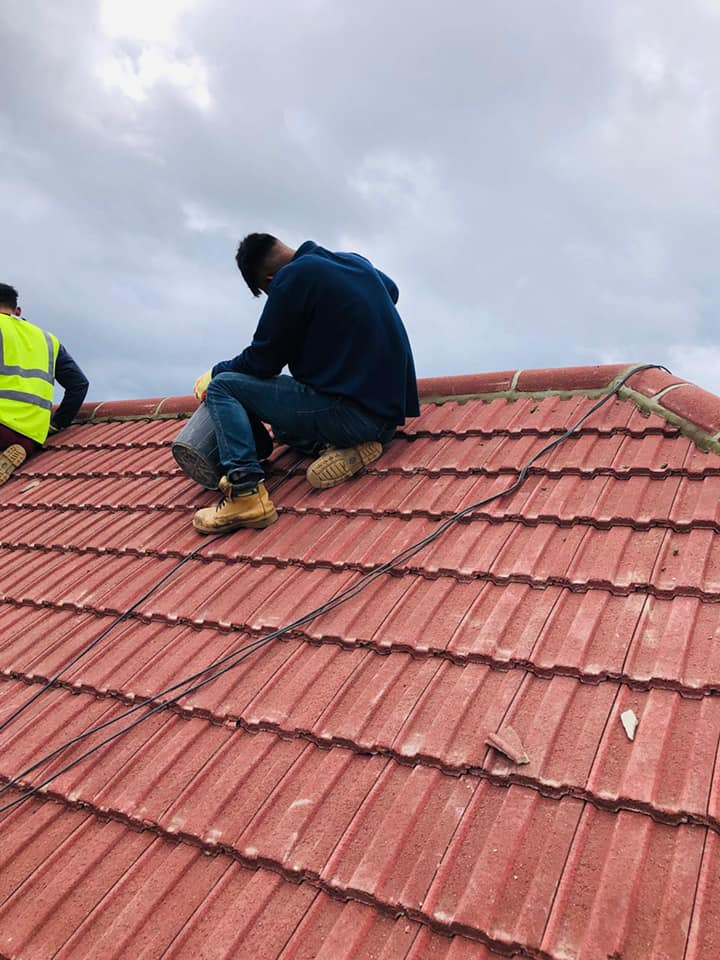 Professional roofers working on a property in London - KS Roof Master