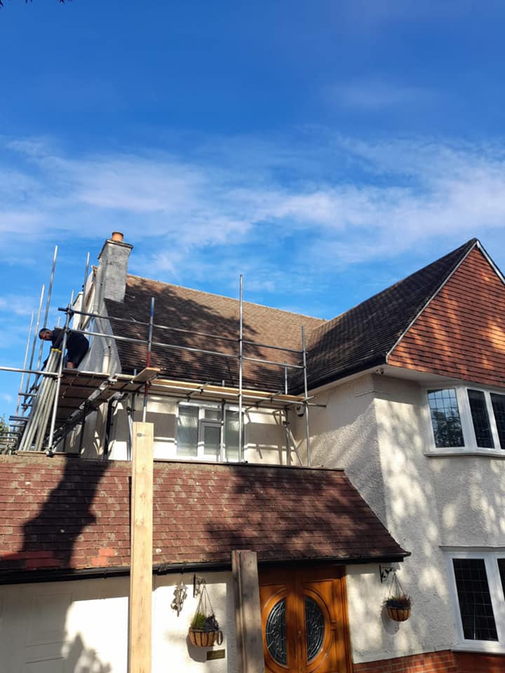 Professional roofers working on a property in London - KS Roof Master