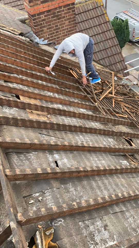 Professional roofers working on a property in London - KS Roof Master