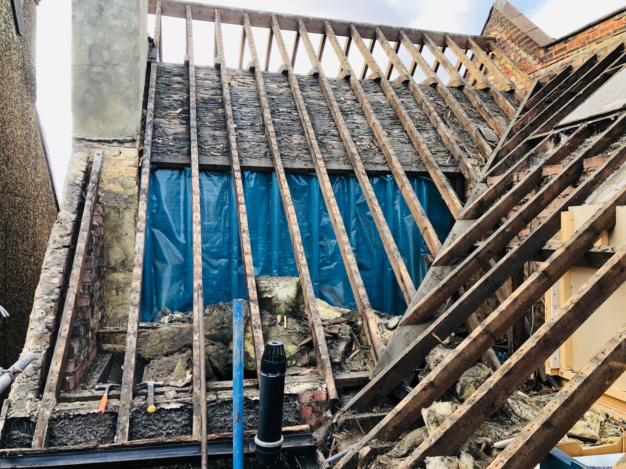 Professional roofers working on a property in London - KS Roof Master