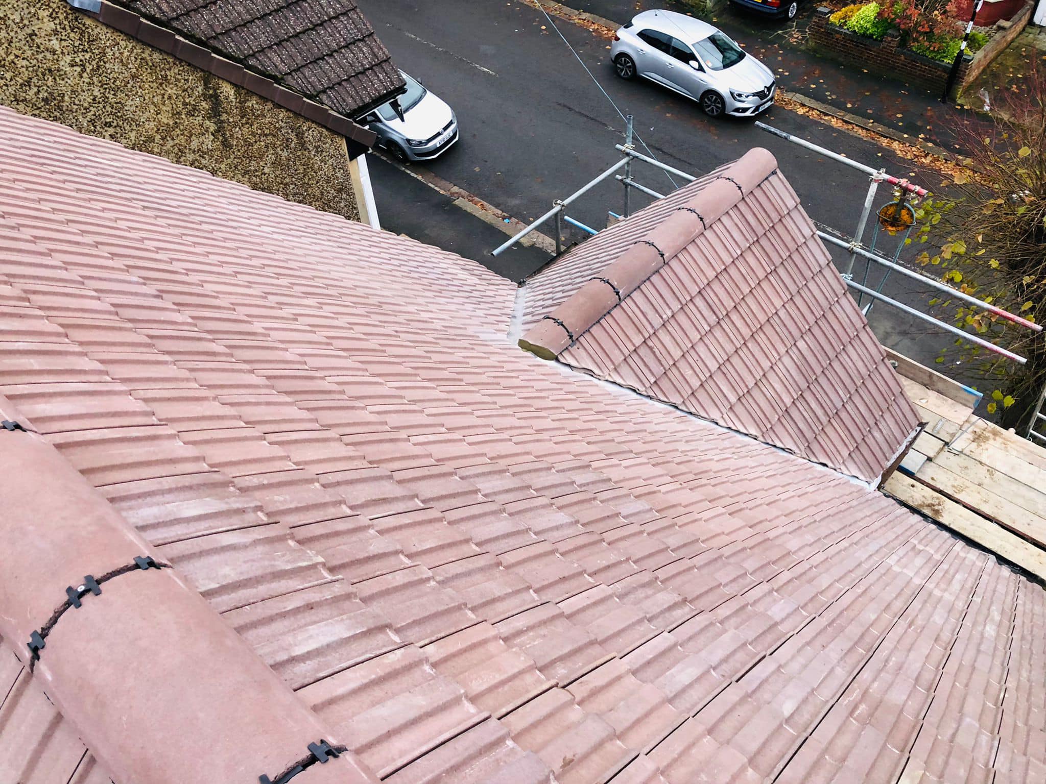 Professional roofers working on a property in London - KS Roof Master